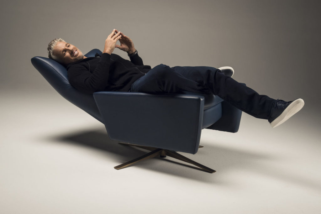 Man reclined in a Comfort Air Stratus Chair