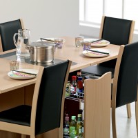 Skovby SM 101 Multi-Function Table being used for dining with both sides extended.
